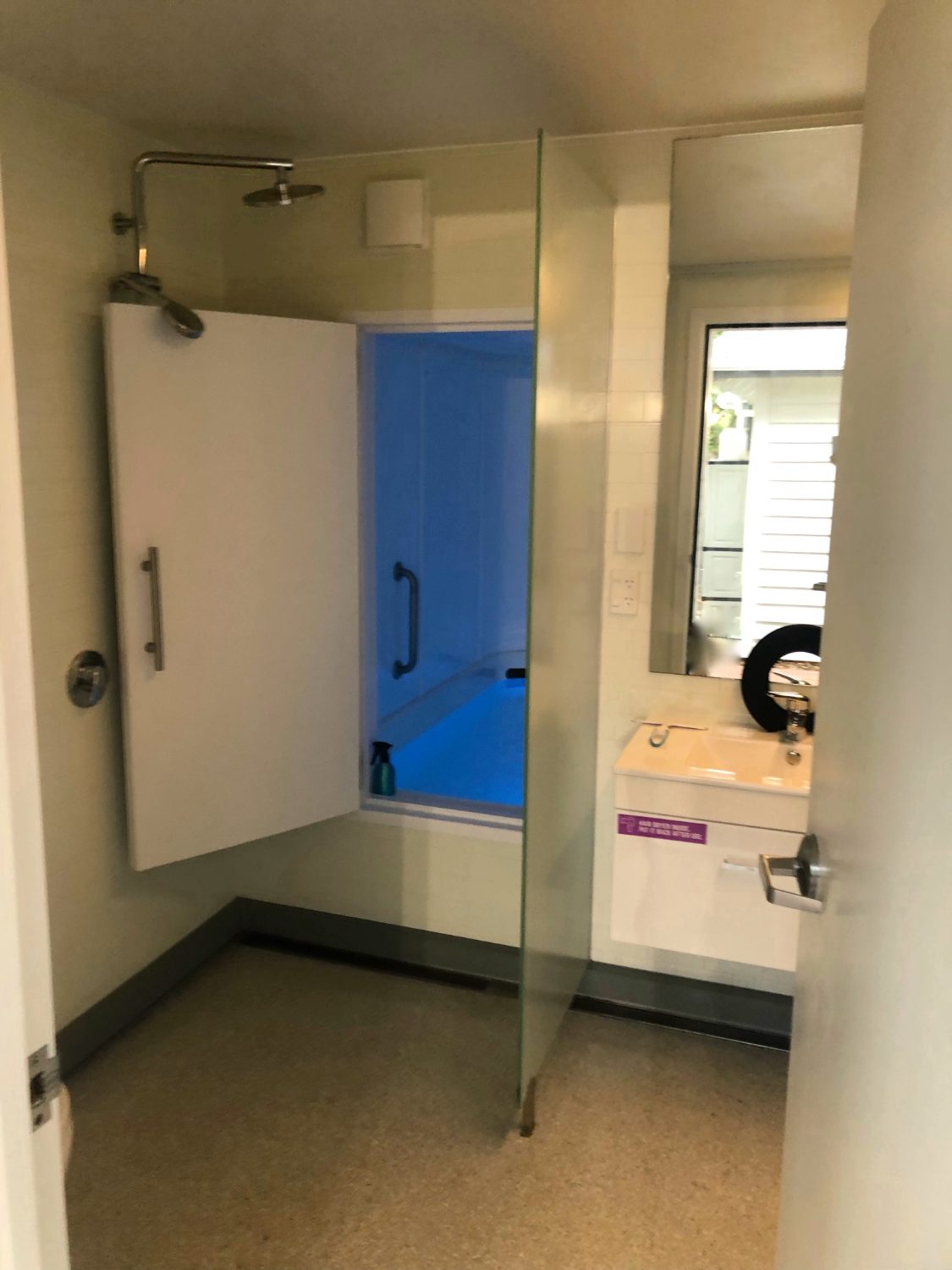 A private ensuite with rain shower beside the float room
